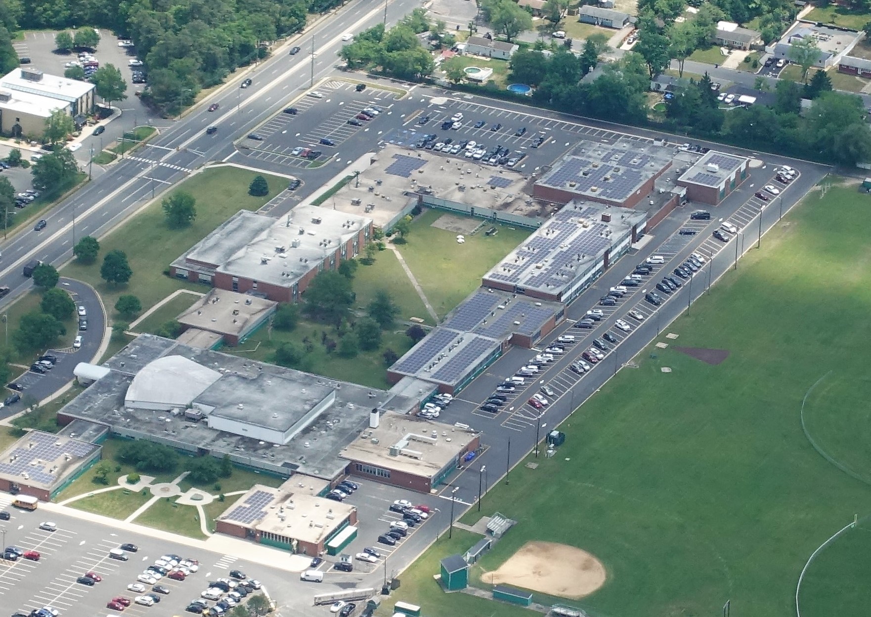 brick high school rooftop solar panels